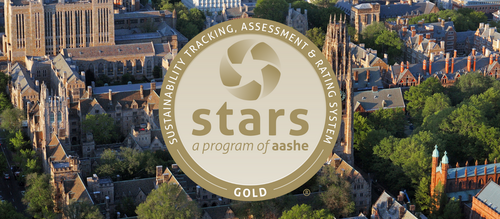 STARS gold logo in the middle of campus shot
