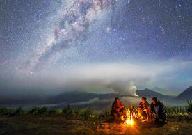 night sky above a campfire