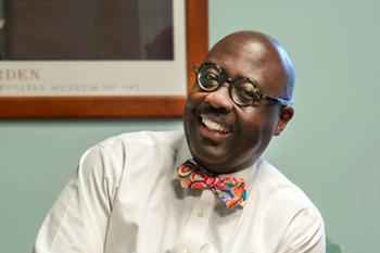 willie jennings smiling at desk