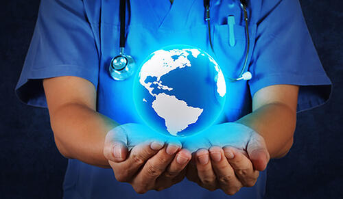 globe in doctors hands
